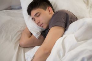 A man sleep during the day.