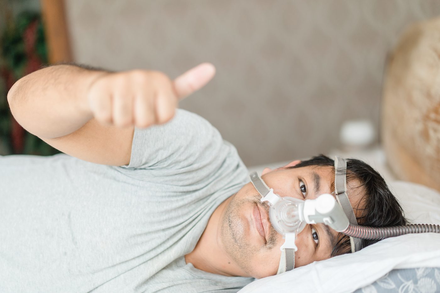 Stock image of man wearing cpap mask